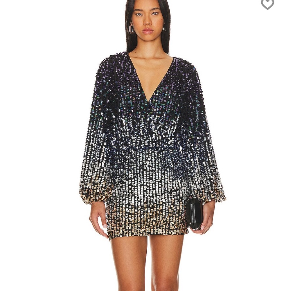 Trinia Embellished Mini Dress
Camila Coelho